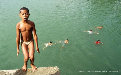 Kids go river jumping in Baganga