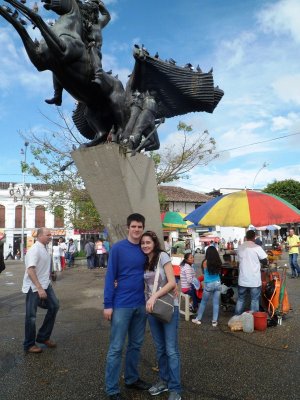 Santiago and Laura at Statue in Parque Principal - Rionegro.jpg