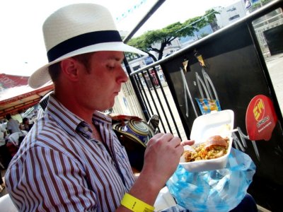 Drew Eating Lechon - Feria de Cali.JPG