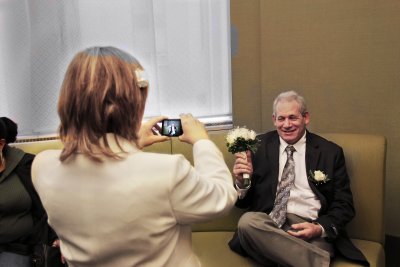 Orna enjoyed photographing Moshe with flowers before their wedding ceremony at the City Clerk's Marriage Bureau in Manhattan :-)