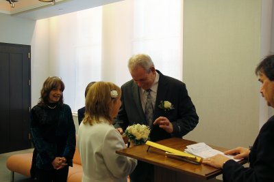 Moshe gives Orna her wedding ring during their wedding ceremony - at the City Clerk's Marriage Bureau in Manhattan 