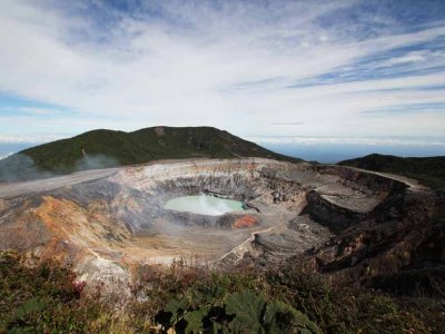 The Poas Volcano: The crater is more than one mile across - second largest in the world. Steam is seen in this photo.