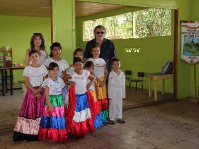 Judy and Richard with the student dancers at a small, rural school.