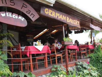 Judy eating lunch at Tom's Pan German Bakery in the village of Nueva Arenal. German expatriates live in the area.