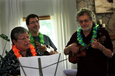 John, John & Richard serenade Diane (Administrative Assistant) at her retirement party