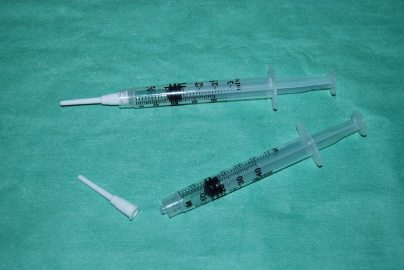 Grease/lube injector