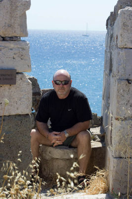 Ian posing on a round pot - Castle of Neratzia