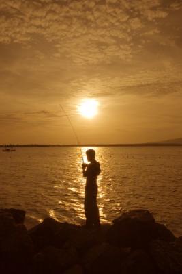 Siluet of fisherman
