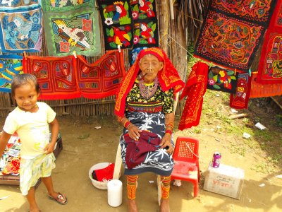 San Blas, old woman and kids - learning to get one dollah