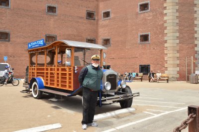 Mr Toad in front of his 1918 Woodie