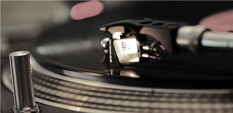 Listening to vinyl.