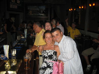 our new friends - thats me screaming ... the man in yellow bought our drinks all night!