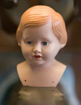 Doll head (with holes to attach a body to)