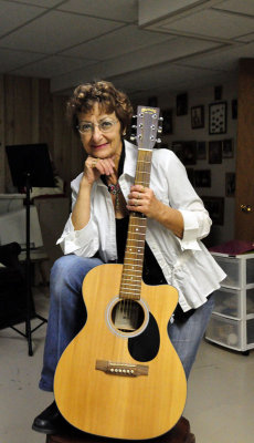 Rosemary with her guitar.