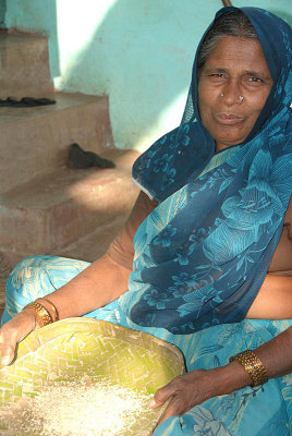 Woman Sifting Rice Badami