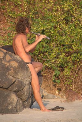 Man Playing Flute on Kalacha Beach