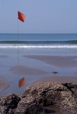 Red Flag by Rocks North Goa