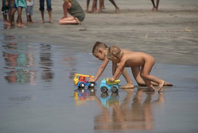 Kids Playing Trucks on the Beach Goa