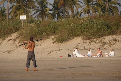 Man Practising with Firestick Mandrem Beach
