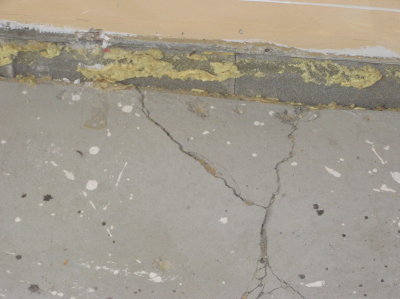 the crack goes all the way across the slab.