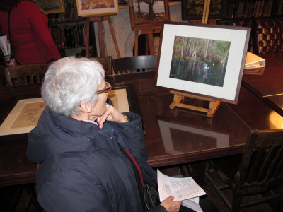 Admiring 'President's Best in Show' Award Painting by Peter Cerillo