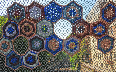 Crochet Stitch Pattern on a Chain Link Fence
