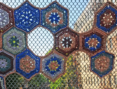 Crochet Stitch Pattern on a Chain Link Fence