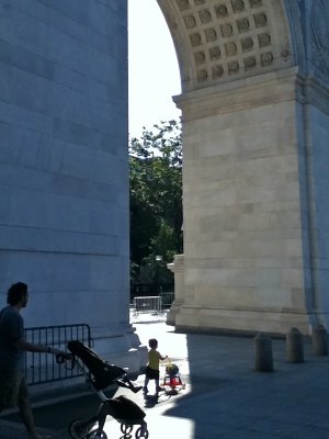 Father & Child Walking Through the Arch