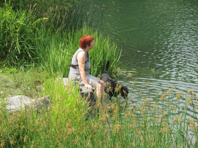 Red Headed Woman with Black Dog in Parc La Fontaine