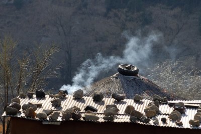 Basotho hut, with improvised weather resistance