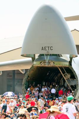 A crafty C-5 Galaxy scooping hapless civilians into its belly