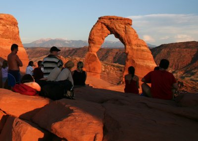 The arch draws quite a crowd for sunset
