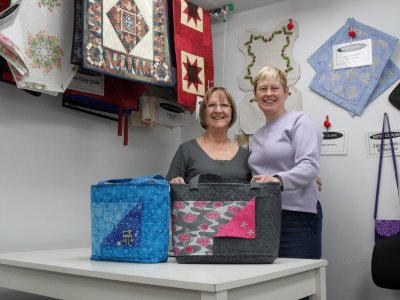 Jane & Margaret show off their new Irana bags.