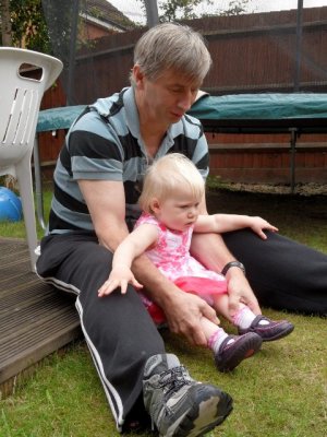 Pete puts Edie's shoes back on