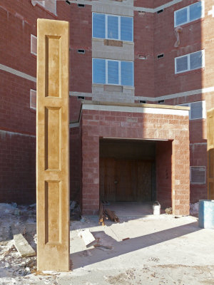 Pillars in front, Entrance in the background