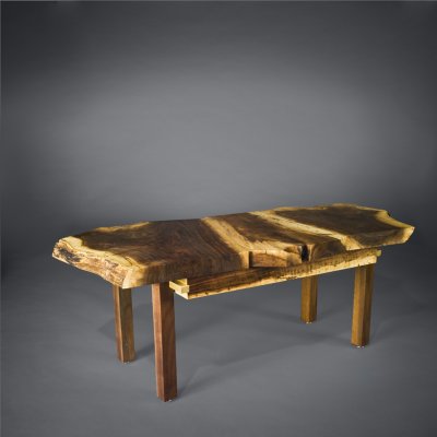 Walnut coffee table w/ persimmon drawer sides and slides, 50 x 24 x 18 h.  Photo by Roy Adkins.