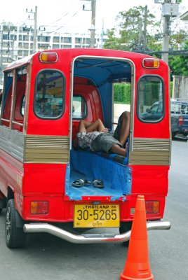 Tuk-tuks have been replaced in Phuket with small red vans with open sides, known as Saetows.