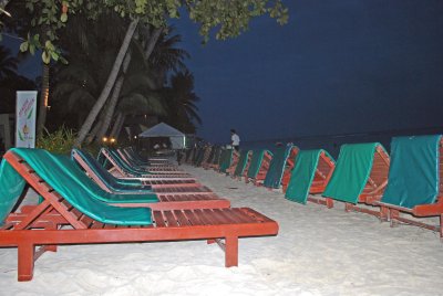 Beach chairs at night outside our Samui accom.