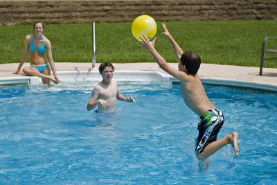 Garrett jumping into pool