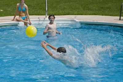 Garrett jumping into pool