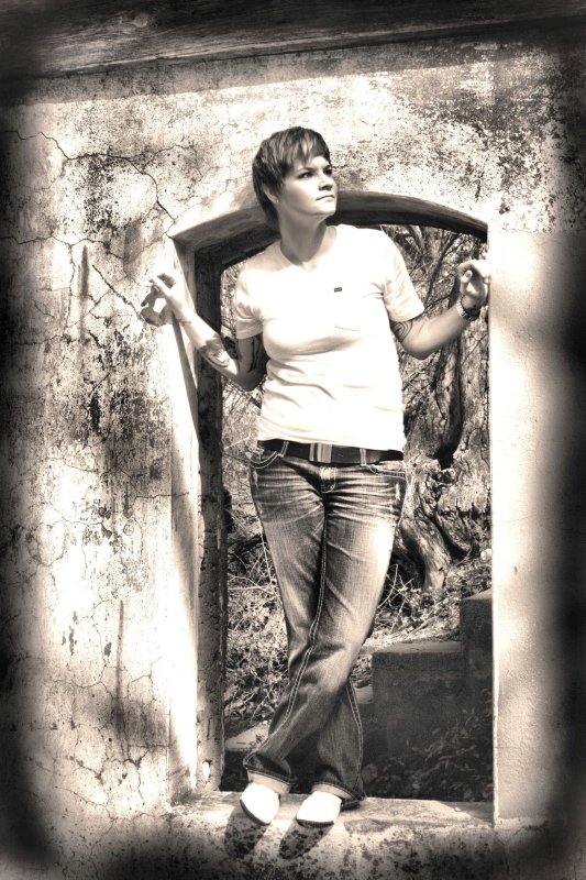 STANDING IN THE WINDOW