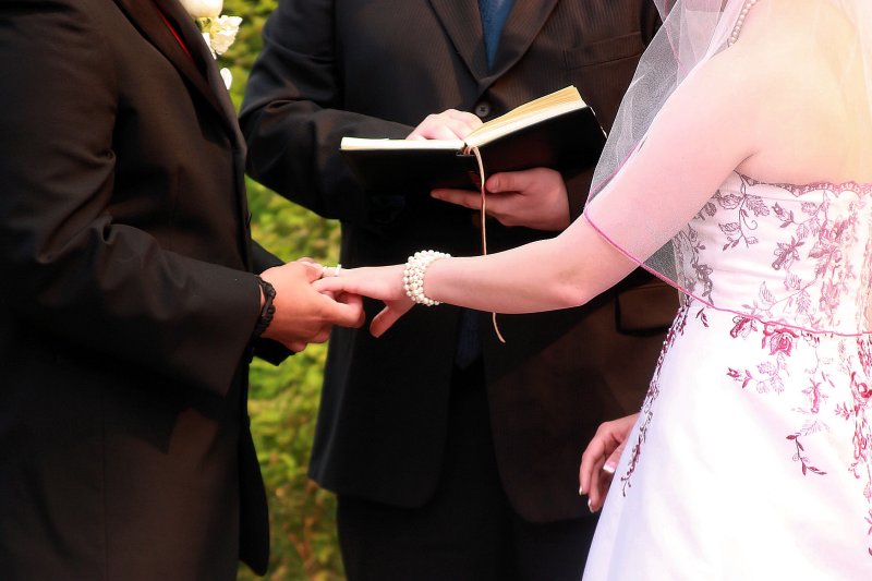 WITH THIS RING