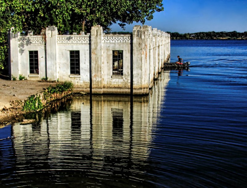 TRANSITIONING HIS BOAT INTO THE BOAT HOUSE