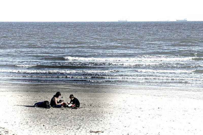 CHECKING OUT SHELLS WITH MOM
