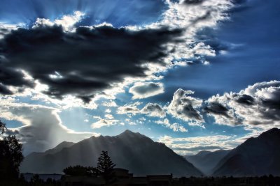 SUN RAYS ON A MOUNTAIN