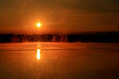 MIST ON AN ORANGE LAKE