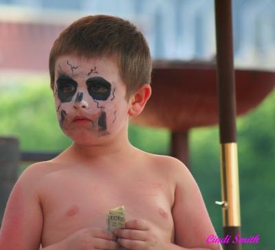 PAINTED FACE WITH A BUCK