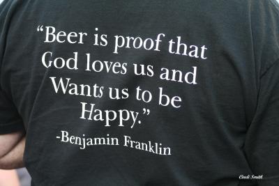YOU WEAR A T-SHIRT THAT SAYS Beer is proof that God loves us and Wants us to be Happy.