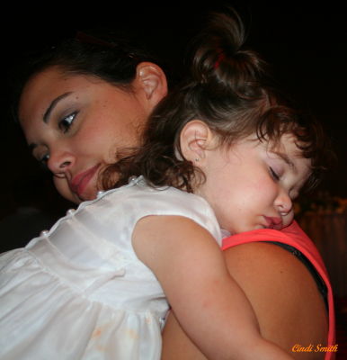 MOTHER WITH VERY TIRED DAUGHTER