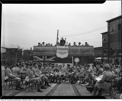 Band waiting in shorts at the 100000th Bren gun ceremony John Inglis Co. Ltd.jpg